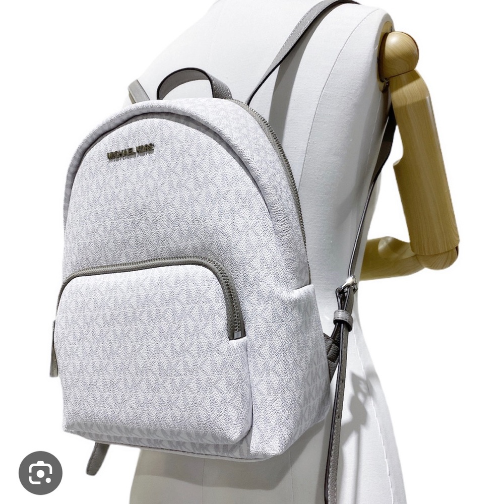 Cute Michael Kors grey and white backpack